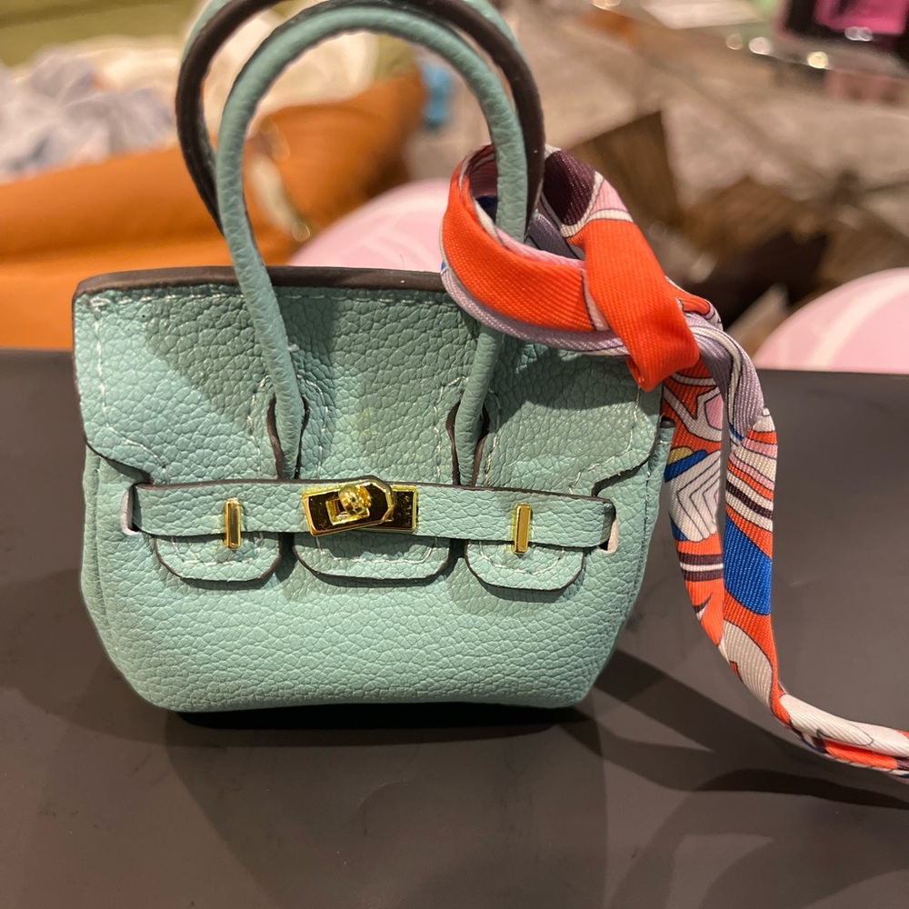 Elegant Mint Green Handbag with Scarf Accent